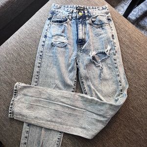 Lightly worn, high waisted, Nasty gal jeans with split ankle detail